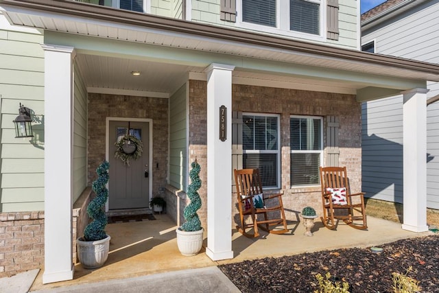 property entrance with covered porch