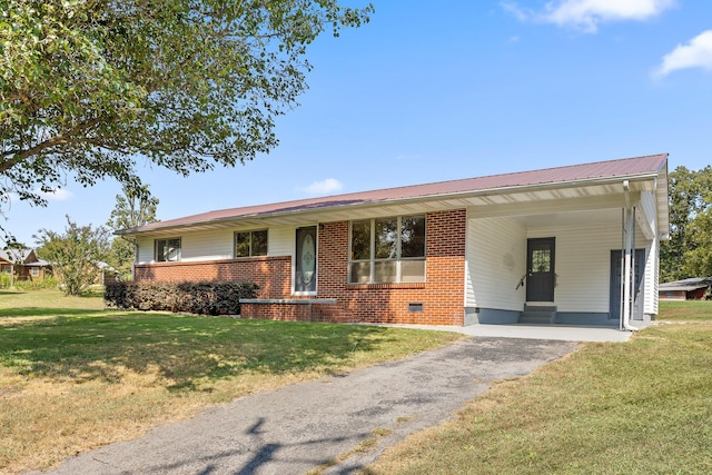 single story home with a carport and a front yard