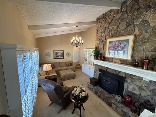 carpeted living room with an inviting chandelier, lofted ceiling with beams, a textured ceiling, and a stone fireplace