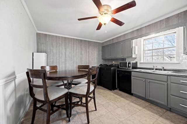 kitchen featuring sink, dishwasher, crown molding, and gray cabinets