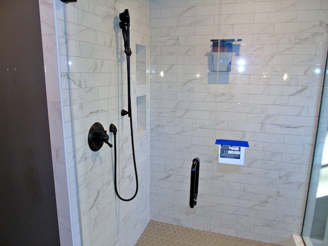 bathroom featuring a stall shower