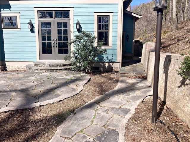 property entrance featuring french doors