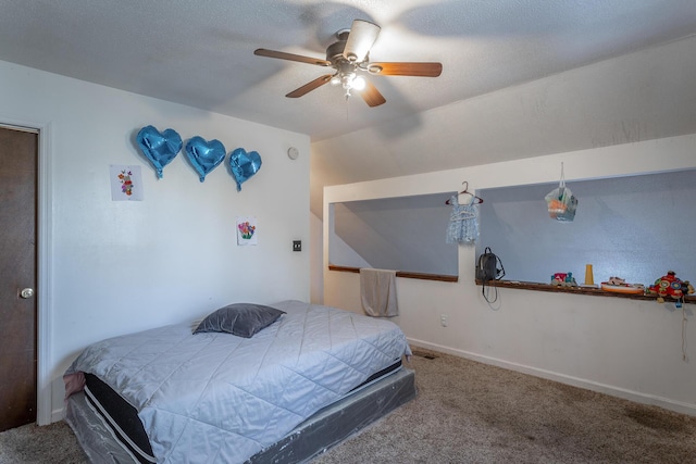 bedroom with ceiling fan, carpet, and lofted ceiling