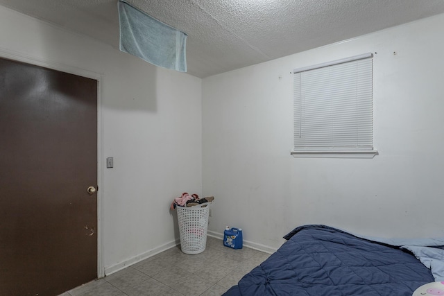 bedroom with a textured ceiling