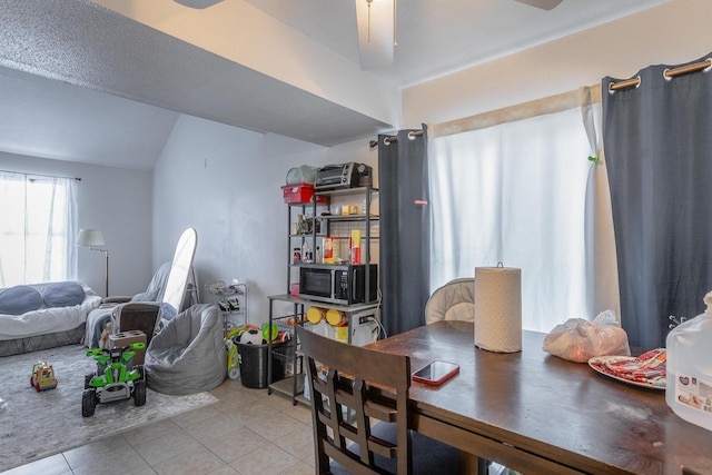 dining room featuring light tile patterned floors