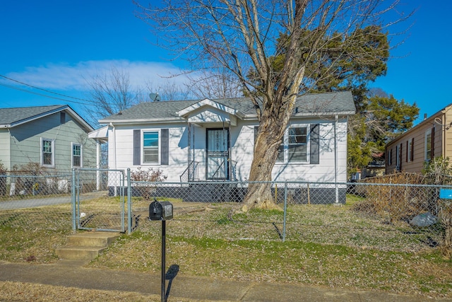 bungalow-style home featuring a front lawn