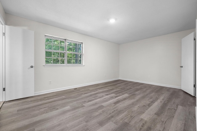 empty room featuring light hardwood / wood-style flooring