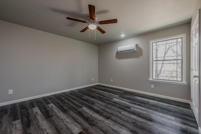 spare room with dark wood-style flooring, baseboards, a wall mounted air conditioner, and ceiling fan