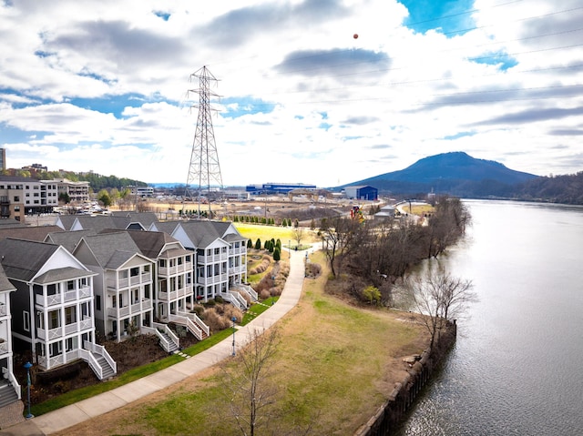 bird's eye view with a water and mountain view