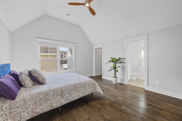 bedroom with ensuite bathroom, dark hardwood / wood-style flooring, lofted ceiling, and ceiling fan