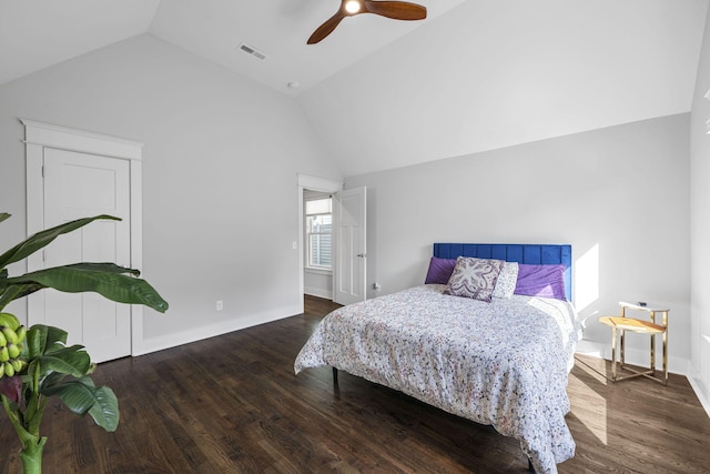 bedroom featuring ceiling fan, lofted ceiling, and dark hardwood / wood-style flooring