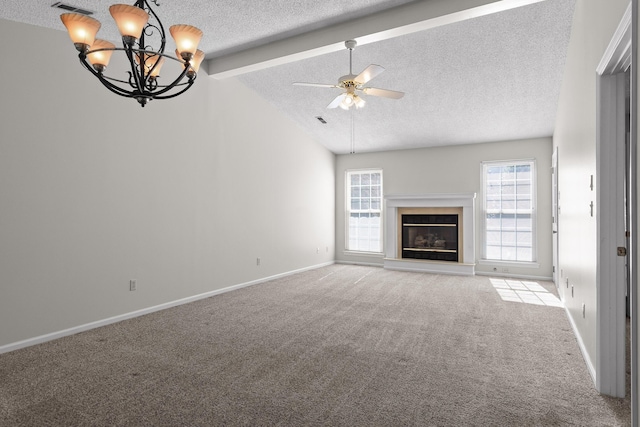 unfurnished living room featuring baseboards, a glass covered fireplace, light colored carpet, vaulted ceiling with beams, and a textured ceiling