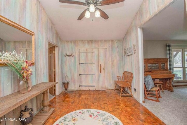 entryway featuring ceiling fan