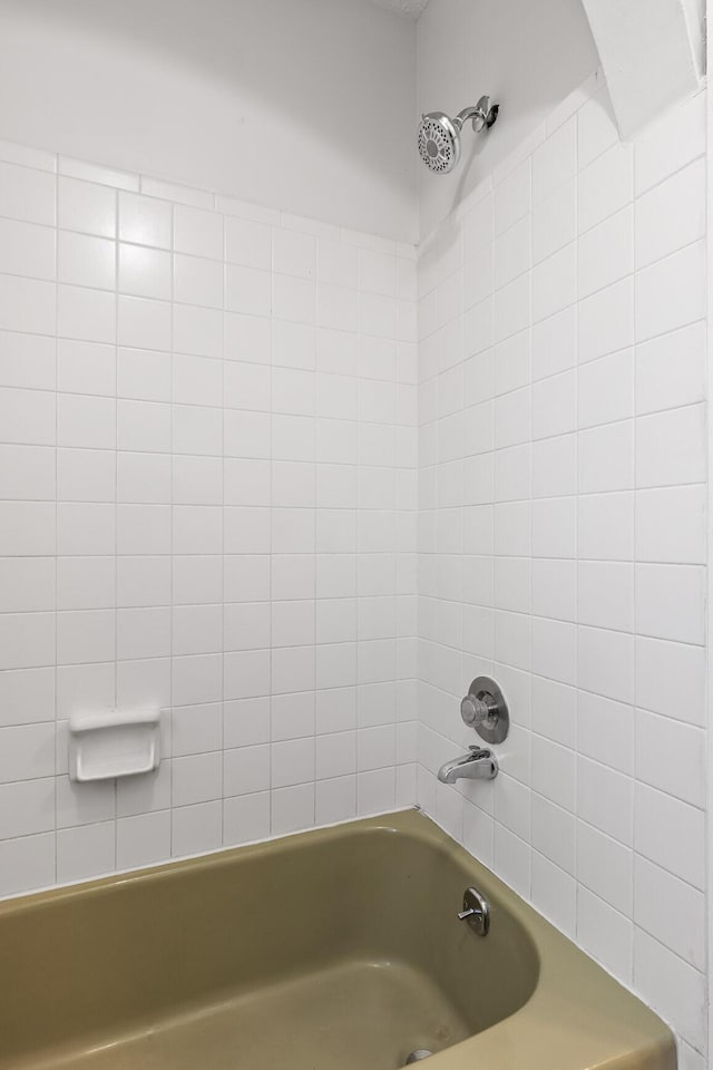 bathroom featuring shower / washtub combination