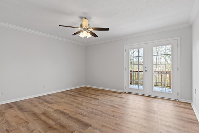 empty room featuring light hardwood / wood-style floors, ceiling fan, french doors, a textured ceiling, and crown molding