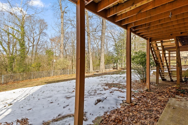 view of snow covered patio