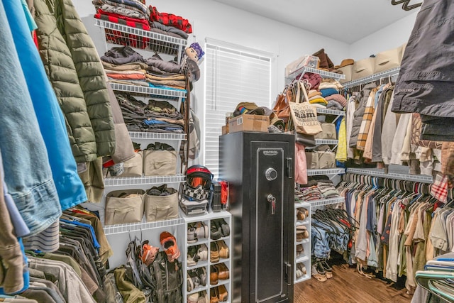 spacious closet featuring hardwood / wood-style flooring