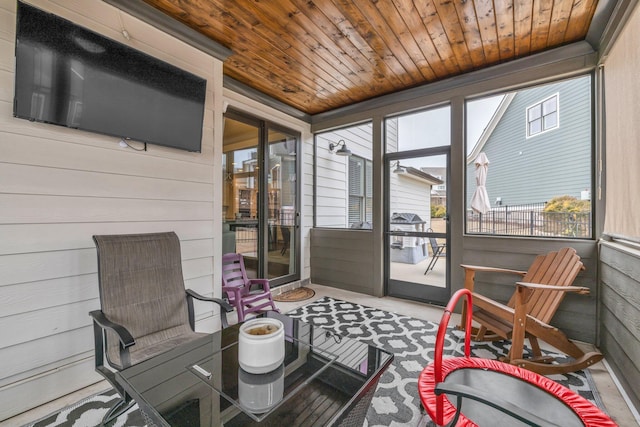 sunroom with wood ceiling