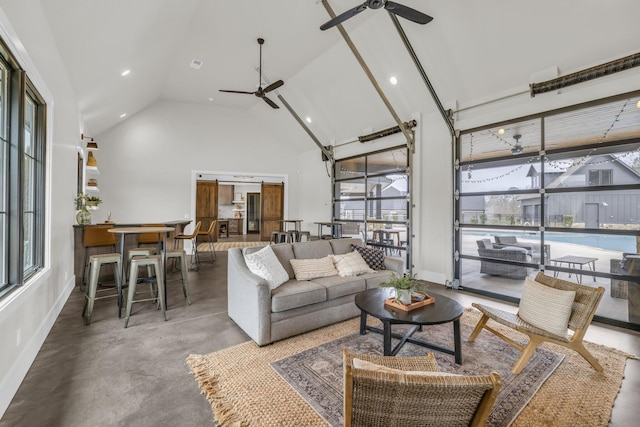 living room with concrete flooring, high vaulted ceiling, and ceiling fan