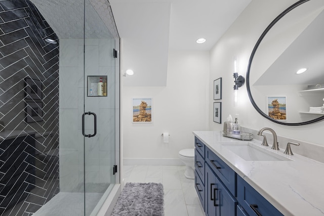 bathroom with vanity, a shower with door, and toilet