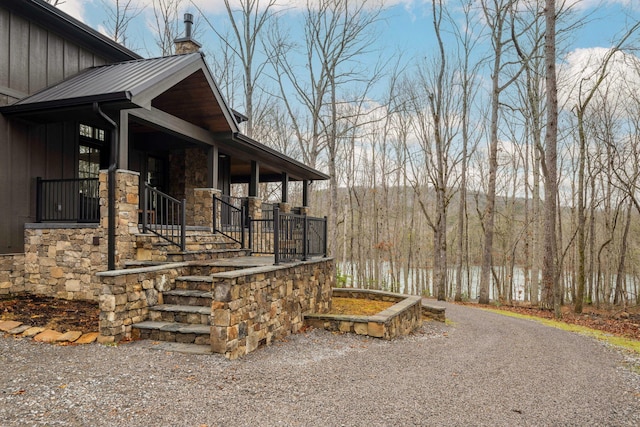 view of property exterior featuring a porch