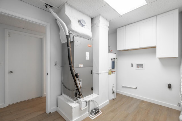 utility room with water heater