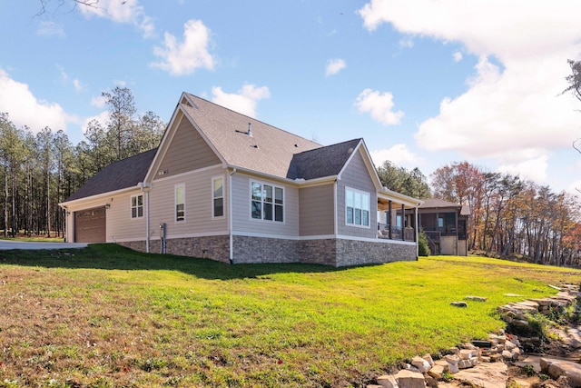 3745 Raulston Falls Rd, Jasper, TN 37347 - view of side of home featuring a yard, a garage, and a sunroom