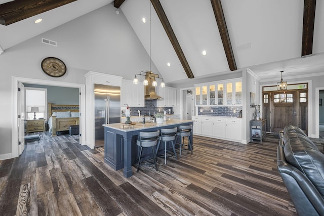 3745 Raulston Falls Rd, Jasper, TN 37347 - kitchen featuring stainless steel built in refrigerator, decorative light fixtures, a kitchen island with sink, and white cabinets