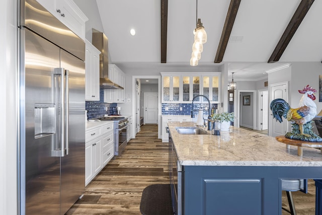 3745 Raulston Falls Rd, Jasper, TN 37347 - kitchen featuring extractor fan, sink, hanging light fixtures, high quality appliances, and white cabinets