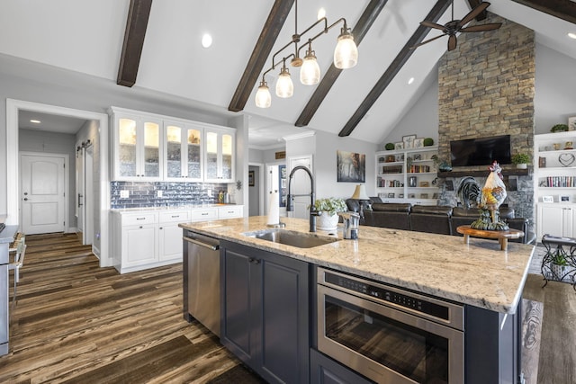 3745 Raulston Falls Rd, Jasper, TN 37347 - kitchen with sink, white cabinetry, stainless steel appliances, an island with sink, and dark hardwood / wood-style flooring