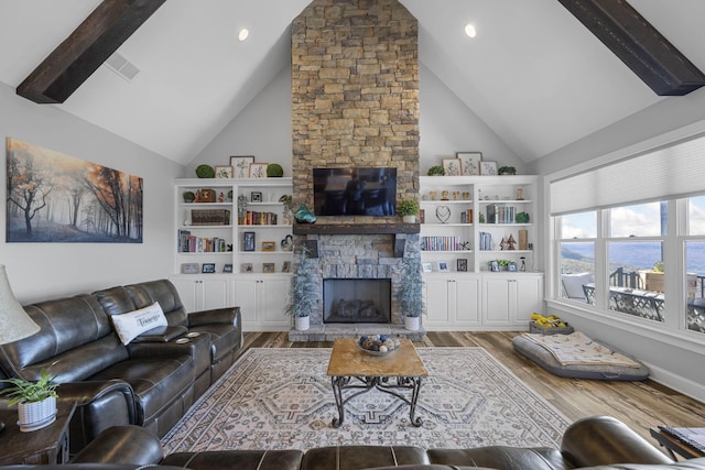 3745 Raulston Falls Rd, Jasper, TN 37347 - living room featuring hardwood / wood-style flooring, high vaulted ceiling, a fireplace, and beamed ceiling
