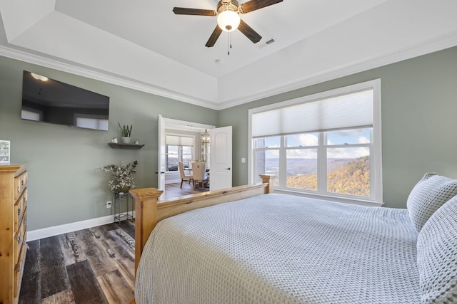 3745 Raulston Falls Rd, Jasper, TN 37347 - bedroom featuring crown molding, ceiling fan, dark hardwood / wood-style flooring, and a raised ceiling