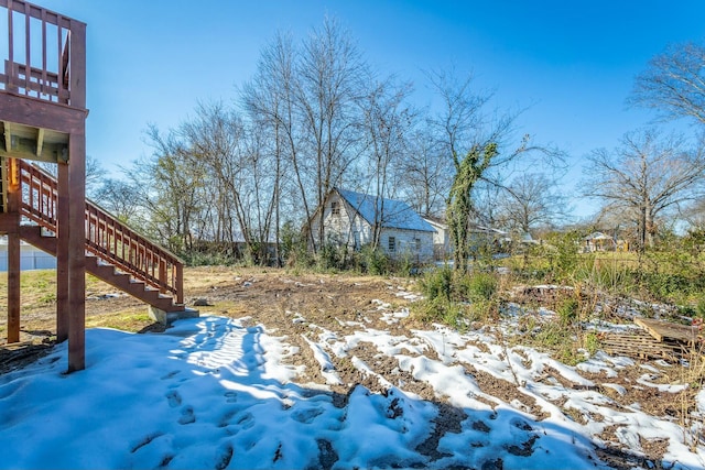 view of yard covered in snow