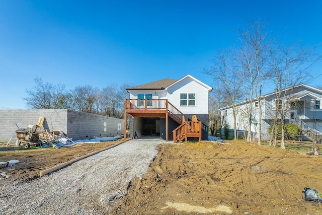 view of front of home with a deck