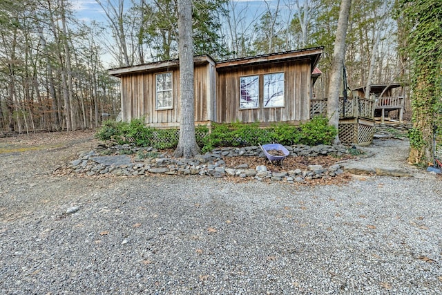 view of home's exterior featuring a deck