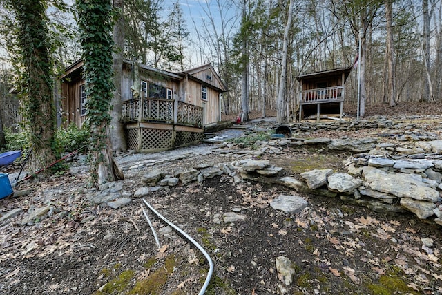 view of yard with a wooden deck