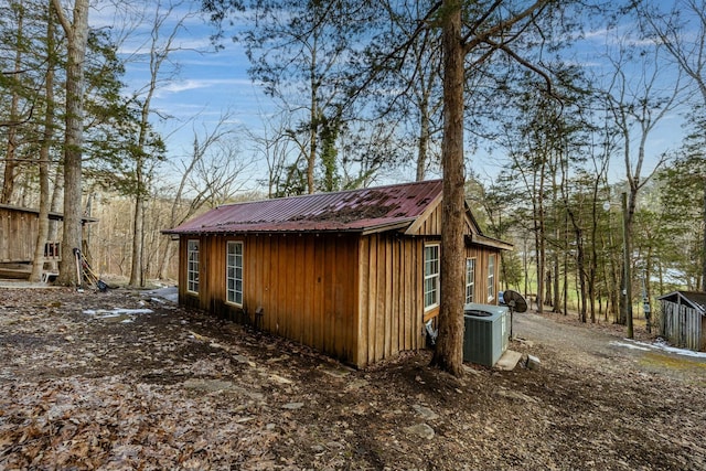 view of outbuilding with central air condition unit