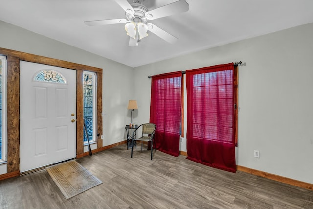 foyer featuring ceiling fan and hardwood / wood-style flooring
