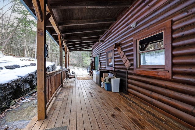 view of snow covered deck