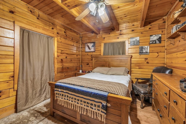 bedroom with wooden ceiling, wood walls, and beamed ceiling