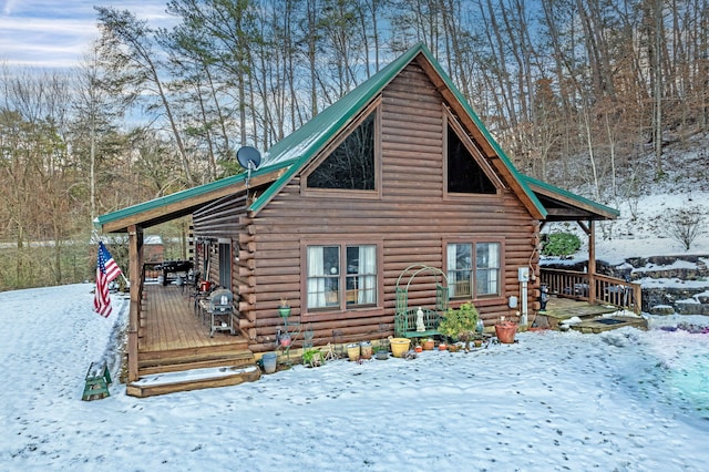 view of snow covered property