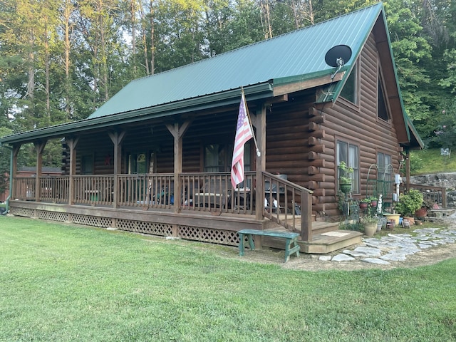 view of front of house with a front lawn and a porch