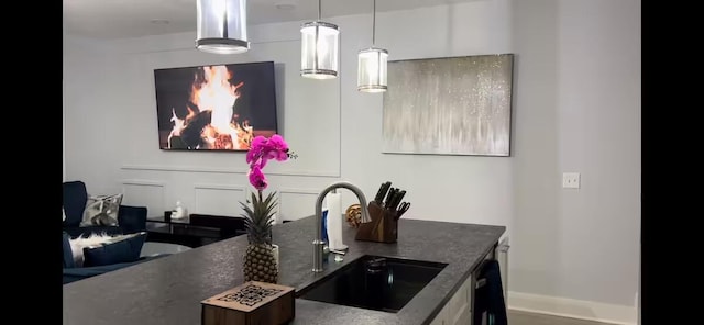 kitchen featuring sink and pendant lighting