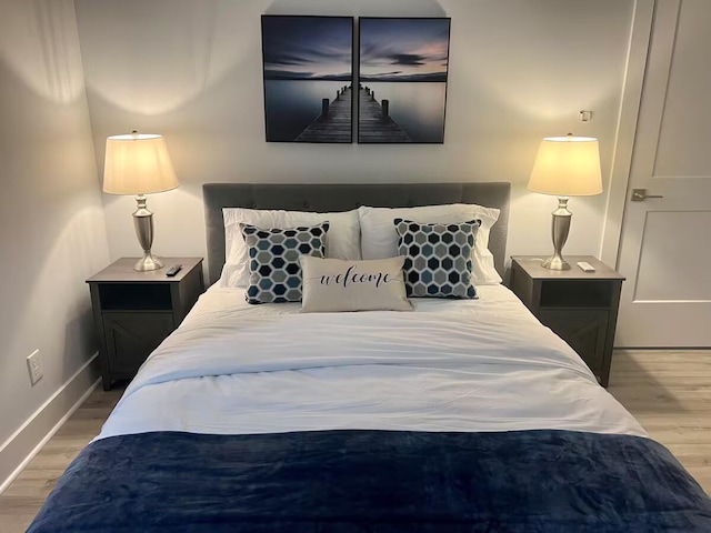 bedroom featuring hardwood / wood-style flooring