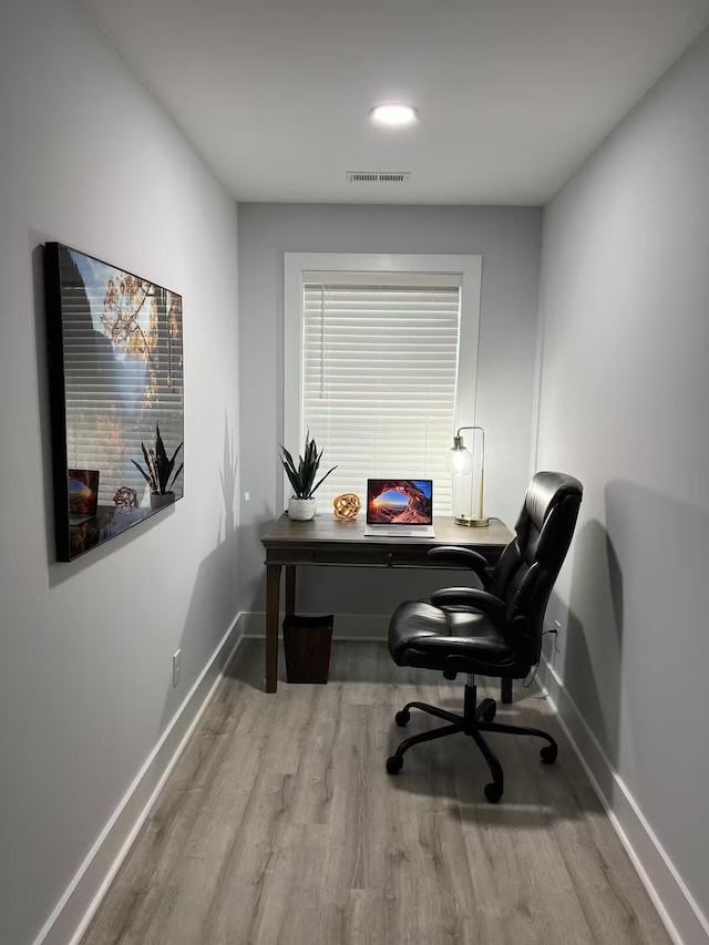 office area with light wood-type flooring