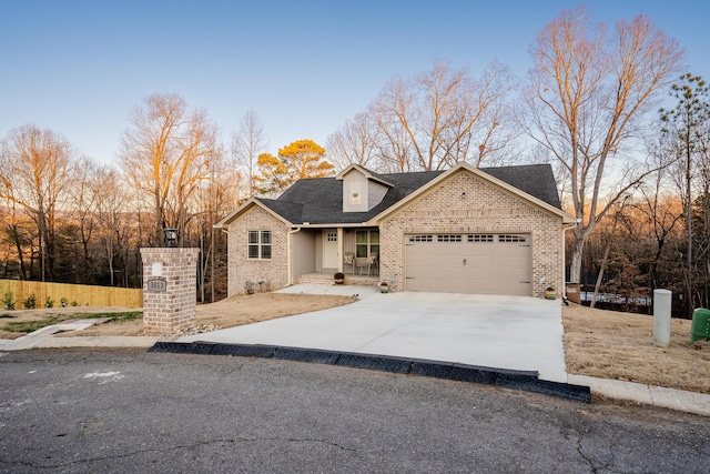 view of front of home with a garage