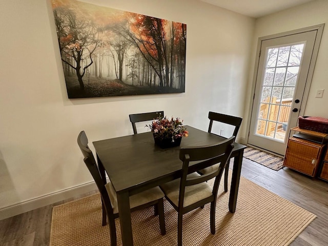 dining room with light hardwood / wood-style flooring