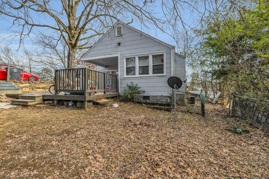 exterior space featuring a wooden deck