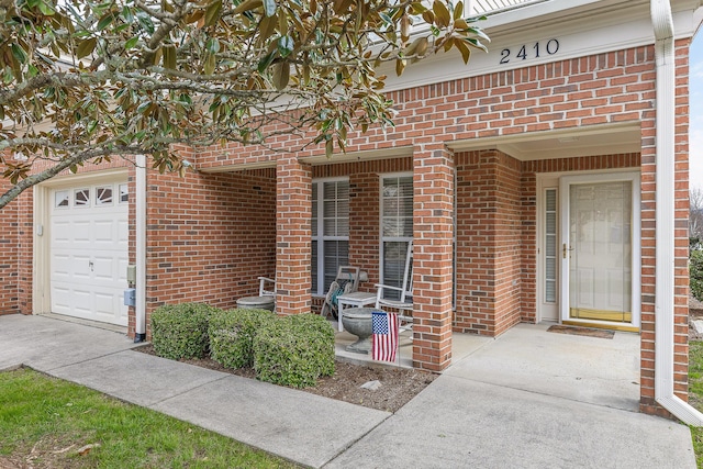 property entrance with a garage