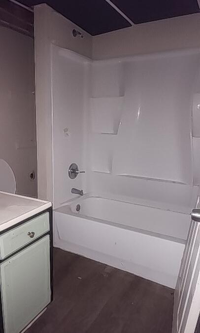 bathroom with shower / bathtub combination and vanity